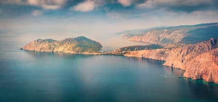 Panoramic spring view of Asos peninsula and town. Dramatic morning seascape of Ionian Sea. Great outdoor scene of Kephalonia island, Greece, Europe. Traveling concept background.の写真素材