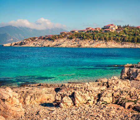 Sunny spring scene of empty Emblisi beach. Colorful view of Kefalovia island, Greece, Europe. Bright morning seascape of Ionian Sea. Traveling concept background.の写真素材
