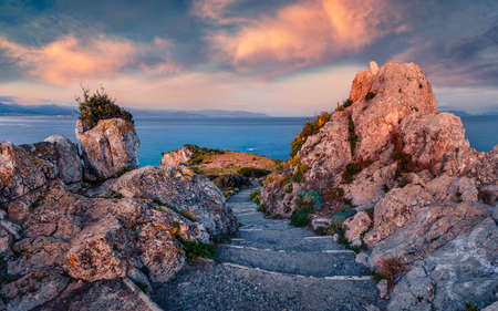 Wonderful sunrise on Milazzo cape. Picturesque spring view of Sicily, Italy, Europe. Magnificent seascape of Mediterranean sea. Beauty of nature concept background.の写真素材