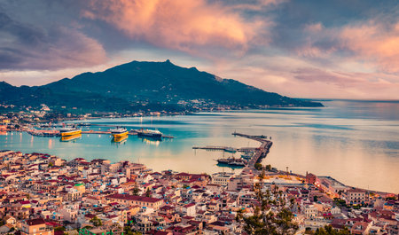 Exciting sunrise on Zakynthos (Zante) city. Colorful summer sunrise on Ionian Sea, Zakinthos island, Greece, Europe. Traveling concept background.の写真素材