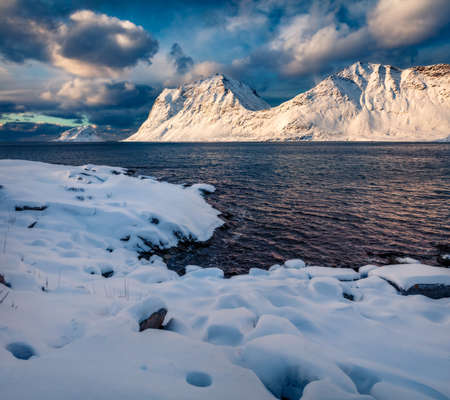 Breathtaking winter view of Lofoten Islands, Norway, Europe. Majestic morning scene of popular tourist destination - Skagsanden beach, Flakstadoya island. Untouched Winter Landscape.の写真素材
