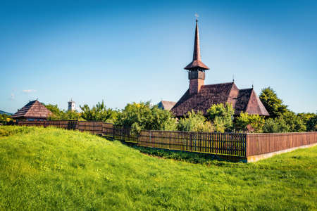 Old wooden church Michael the Brave. Fresh green scene of Iulia Alba town, Transylvania, Romania, Europe. Travel concept background.の写真素材