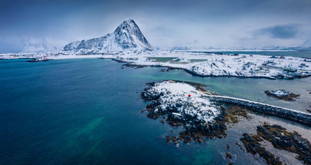 Dramatic winter view from flying drone of small fishing village - Hovsund, Norway, Europe. Amazing...