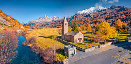 aerial landscape photography. Colorful view from flying drone of San Lurench church in Sils im Engadin village. Bright morning scene of Swiss Alps, Switzerland, Europe.の写真素材