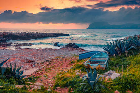 beautiful marine scenery. Splendid spring sunset on Sicily, Isolidda Beach, San Vito cape, Italy,...