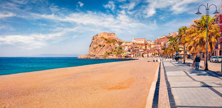 Bright morning view of Scilla town with Ruffo castle on background, administratively part of the Metropolitan City of Reggio Calabria, Italy, Europe. Panoramic Mediterranean seascape.の写真素材