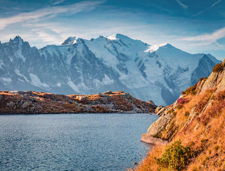 beautiful autumn scenery. Majestic autumn view of Cheserys lake with Mount Blanc on background, Chamonix location. Great outdoor scene of Vallon de Berard Nature Preserve, Alps, France.の写真素材