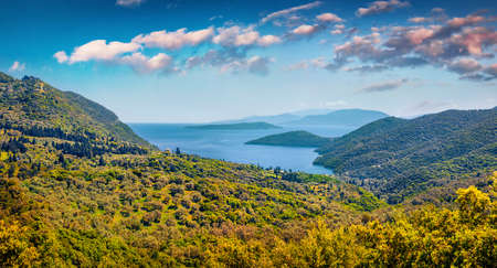 beautiful summer scenery. Panoramic morning view of Vasiliki town valley, Lefkada, Greece, Europe. Colorful morning seascape of Ionian Sea. Travel concept background.の写真素材