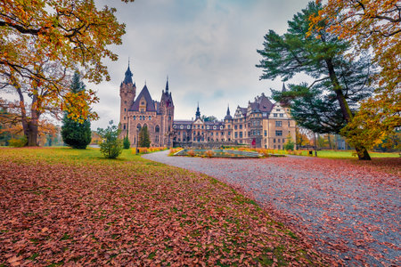 MOSZNA, POLAND - OCTOBER 24, 2017 ; The Moszna Castle, built in the 17th century, extended from 1900 to 1914, is a historic palace located in Moszna, is one of the best known monuments in Upper Silesia.のeditorial素材