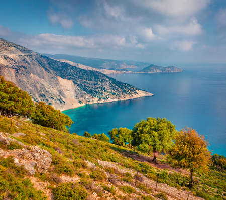 Amazing morning scene of Cephalonia island, Divarata village location, Greece, Europe. Aerial view of Myrtos bay. Colorful summer seascape of Ionian Sea. Beauty of nature concept background.の写真素材
