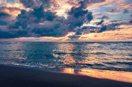 Dramatic summer seascape of the Adriatic sea. Fantastic sunset on Semanit beach. Amazing morning view of Albania, Europe. beautiful summer scenery.の写真素材