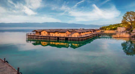 Calm morning scene of popular tourist destination - Bay of Bones. Picturesque spring view of Ohrid lake. Amazing landscape of North Macedonia, Europe. Travel concept background.の写真素材