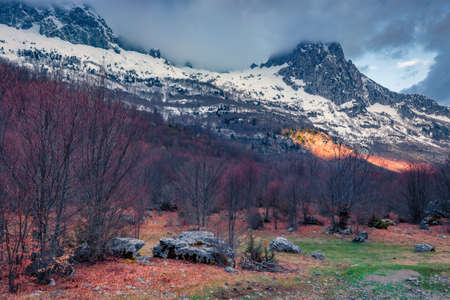 Dramatic spring day in Theth National Park with snowy peaks on background. Early spring in Albania, Europe. beauty of nature concept background.の写真素材