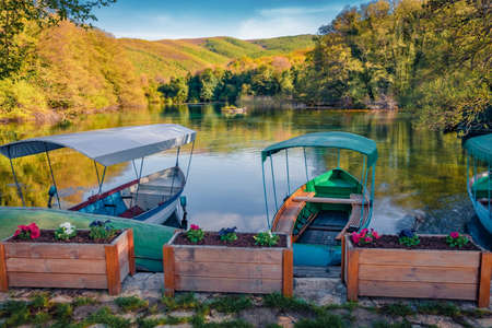 Pleasure boats on the shore of Ohrid lake in St. Naum Monastery. Spectacular spring scene of North Macedonia, Europe. Travel concept background.の写真素材