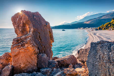 Sunny morning view of Livadhi beach, Himare location. Splendid spring scene of Albania, Europe. Attractive seascape of the Adriatic sea. Beauty of nature concept background.の写真素材