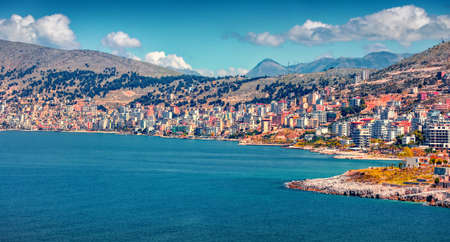 Astonishing summer cityscape of Saranda port. Magnificent Ionian seascape. Spectacular morning scene of Albania, Europe. Travel concept background.の写真素材