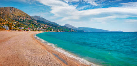 Attractive spring view of Borshit beach. Colorful Qazim Pali cityscape. Captivating morning seascape of the Adriatic sea. Beautiful outdoor scene of Albania, Europe. Travel concept background.の写真素材