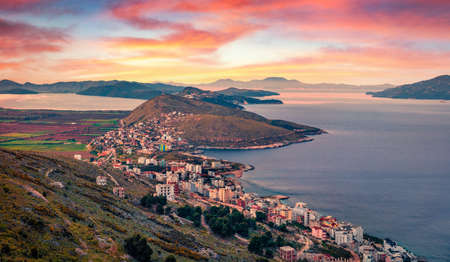 Fantastic sunrise in Saranda. Aerial spring seascape of Ionian sea. Great outdoor scene of Albania, view from Lekursi Castle. Travel concept background.の写真素材