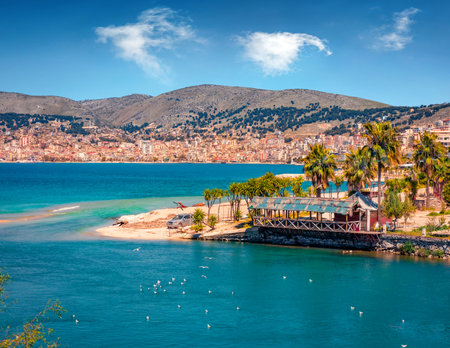 Colorful spring cityscape of Saranda port. Amazing mediterranean seascape. Stunning morning scene of Albania, Europe. Travel concept background.の写真素材