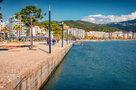Sunny summer cityscape of Vlore town. Bright spring seascape of the Adriatic sea. Spectacular outdoor scene of Albania, Europe. Travel concept background.のeditorial素材