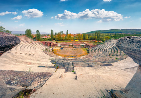 Ancient amphitheater in Betola town, North Macedonia, Europe. Picturesque spring view of archaeological site - Heraklea Lynkestis. Historical site with ruins of Heraclea city.の写真素材