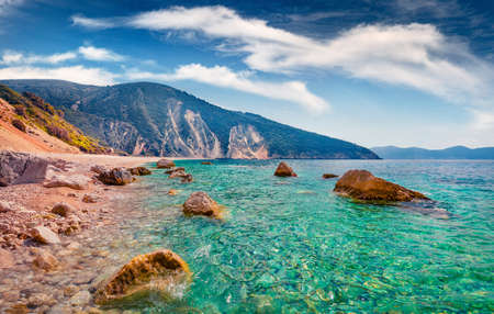 Incredible spring view of Myrtos Beach. Fantastic morning scene of Cephalonia island, Divarata village location, Greece, Europe. Colorful seascape of Ionian Sea.の写真素材