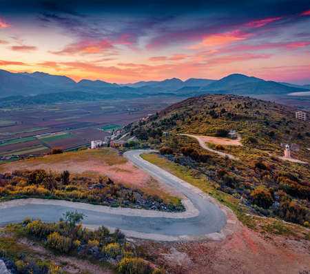 Unbelievable sunrise in outskirts of Saranda town. Spectacular spring seascape of Ionian sea. Amazing outdoor scene of Albania, view from Lekursi Castle. Travel concept background.の写真素材