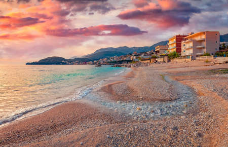 Calm evening view of Himare town. Attractive spring seascape of the Adriatic sea. Amazing outdoor scene of Albania, Europe. Travel concept background.の写真素材