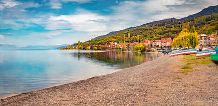 Calm spring cityscape of Peshtani town. Spectacular morning scene of Ohrid lake, North Macedonia, Europe. Travel concept background.の写真素材