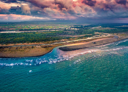 Gloomy spring seascape of the Adriatic sea. View from flying drone of sunset on Semanit beach. Unbelievable evening in Albania, Europe. Travel concept background.の写真素材