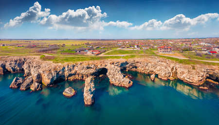 Sunny spring view of popular tourist destination - Tyulenovo cliffs. Attractive morning seascape of Black sea. Beautiful outdoor scene of Bulgaria, Europe. Travel concept background.の写真素材