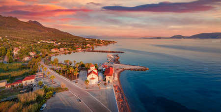 Dramatic summer sunrise in St. georgios port. Captivating morning scene of Peloponnese peninsula, Greece, Europe. Spectacular seascape of Myrtoan Sea. Travel concept background.の写真素材