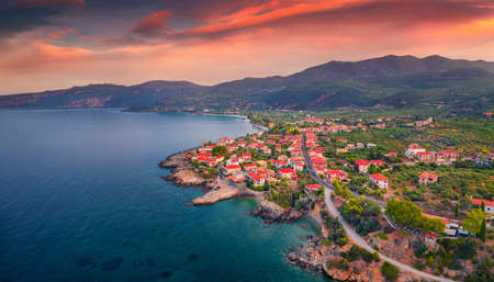 Astonishing summer view of Kardamyli port. Exciting morning seascape of Mediterranean sea. Beautiful sunrise on Peloponnese peninsula, Greece. Travel concept background.の写真素材
