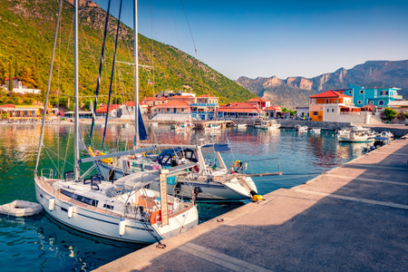 Beautiful summer view of Plaka port. Colorful morning seascape of Mediterranean sea. Sunny outdoor scene of Peloponnese peninsula, Greece, Europe. Travel concept background.の写真素材