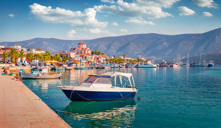 Wonderful summer cityscape of Kilada port with Eastern Orthodox Church on background. Spectacular morning scene of Peloponnese peninsula, Greece, Europe. Colorful seascape of Mediterranean sea.の写真素材