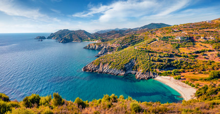 Aerial summer view of Mageiras beach. Sunny morning scene of Euboea island, Greece, Europe. Calm seascape of Aegean sea. Beauty of nature concept background.の写真素材