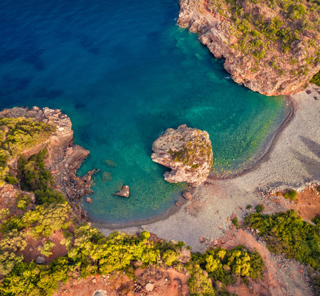 Straight down summer view of Foneas beach. Colorful morning scene of Peloponnese peninsula, Greece, Europe. Colorful summer seascape of Ionian sea.の写真素材