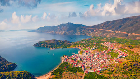 View from flying drone of Palaia Epidavros, small town in the Argolis prefecture of Peloponnese, Greece. Spectacular summer seascape of Mediterranean sea. Travel concept background.の写真素材