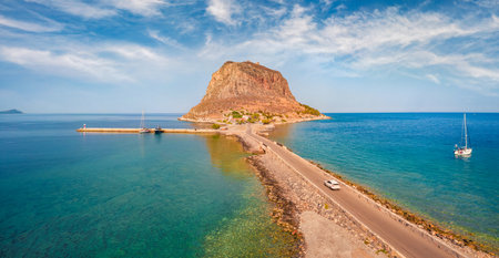 Amazing morning view of Monemvasia island. Wonderful summer scene of Peloponnese peninsula, Greece, Europe. Beautiful seascape of Myrtoan Sea.の写真素材