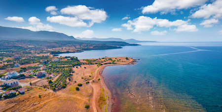 Panoramic summer view of Plitra village. Panoramic outdoor scene of Peloponnese peninsula, Greece, Europe. Spectacular morning seascape of Mediterranean sea. Travel concept background.の写真素材