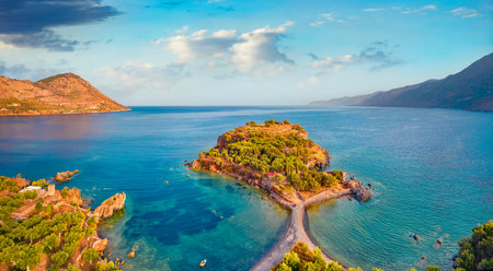 Aerial summer view of Purpose or Double beach, Kotronas town location. Picturesque evening seascape of Mediterranean sea, Peloponnese peninsula, Greece, Europe.の写真素材