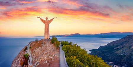 MARATEA, ITALY - AUGUST 31, 2021: Majestic summer view of Statue of Christ the Redeemer. Spectacular morning seascape of Mediterranean seascape. Incredible outdoor scene of Italy, Europe.のeditorial素材