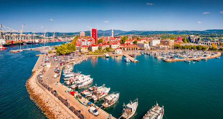 Adorable view from flying drone of Koper port. Colorful summer scene of Adriatic coastline, Slovenia, Europe. Picturesque mediterranean seascape. Travel concept background.の写真素材