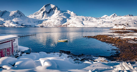 Frosty winter view of small fishing village - Molnarodden. Amazing outdoor scene of Lofoten Islands, Norway, Europe. Spectacular morning seascape of Norwegian sea, Islendingen fjord.の写真素材