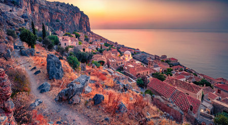 Breathtaking summer cityscape of Monemvasia town. Exciting sunrise on Peloponnese peninsula, Greece, Europe. Beautiful Myrtoanian seascape.の写真素材
