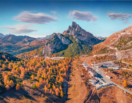 aerial landscape photography. View from flying drone top of Falzarego pass. Majestic autumn scene of Dolomite Alps with Sass de Stria peak on background, Italy, Europe. Travel concept background.の写真素材