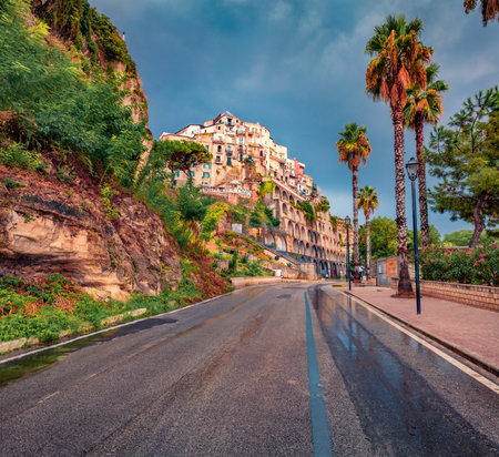landscape photography. Gloomy morning cityscape of Tropea town after the rain, Italy, Europe. Beautiful summer scene of east coast of Calabria. Travel concept background.の写真素材