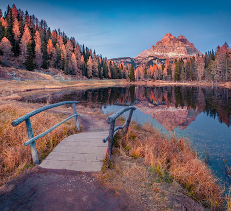 Calm autumn scene of Antorno lake with Tre Cime Di Lavaredo peak on background. Awesome evening scene of Dolomite Alps, Italy, Europe. beautiful autumn scenery.の写真素材