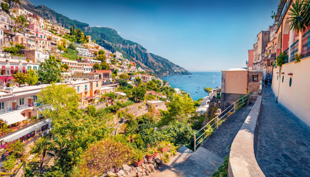 Charming summer cityscape of cliffside village on southern Italy's Amalfi Coast - Positano. Sunny morning seascape of Mediterranean sea. Travel concept background.の写真素材