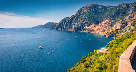 Sunny summer view of popular tourist destination Positano town. Colorful morning view of Mediterranean coast of west Italy, Europe. Travel concept background.の写真素材